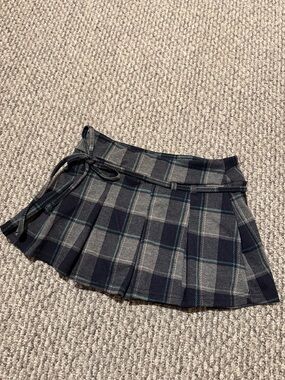 Black Ibis pleated plaid mini skirt